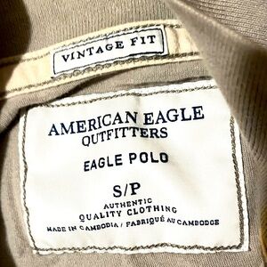 Men’s Short sleeve American eagle grey+white stripped polo size small